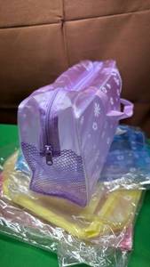 lot 512 image: 4pc Clear Transparent Bag Set with Floral Pattern. Multi Color - Retail $18