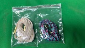 lot 580 image: Two Pairs of Designer Shoelaces with Gold Metal Tips - Retail $9
