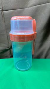 lot 591 image: Colorful Plastic Travel Mug with Spoon Storage 26oz - Retail $15