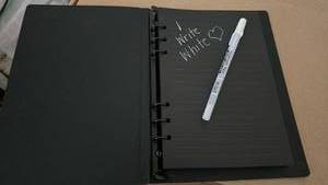 lot 622 image: Black Paper Ring Notebook with White Highlight Pen 6x9 Inch - Retail $14