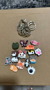 lot 632 image: Cat-Themed PVC Shoe Charms and Key Rings Set - Retail $16