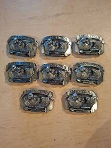 lot 1557 image: (8) Ames Tools Mount Rushmore Belt Buckles