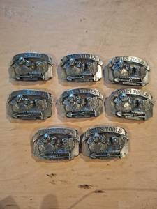 lot 1597 image: (8) Ames Tools Mount Rushmore Belt Buckles