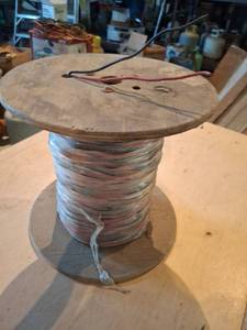 lot 1610 image: Electrical Wire Spool with Red and Black Conductors