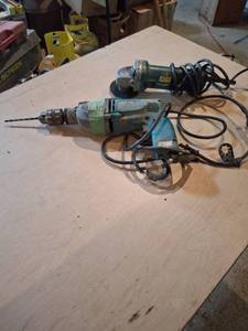 lot 1691 image: Makita Power Tools Lot - Angle Grinder and Drill