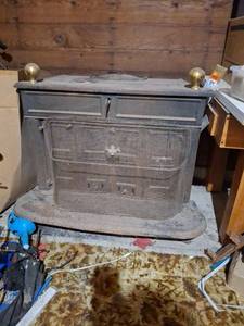 lot 1788 image: Cast Iron Wood Stove with Brass Finials
