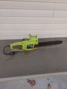lot 1863 image: Poulan 1420 Electric Chainsaw