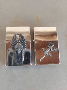 lot 2107 image: Lighter Lot with Native American and Lizard Emblems, 2 pieces
