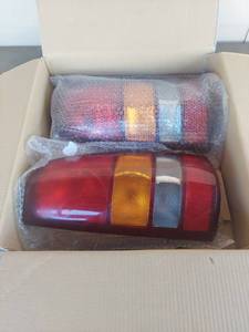 lot 2119 image: 99-06 Suburban  GM Trucks Automotive Tail Light Assembly Pair