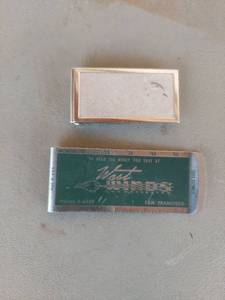 lot 2133 image: (2) Money Clips - West Winds Inc 1953 Calendar on 1