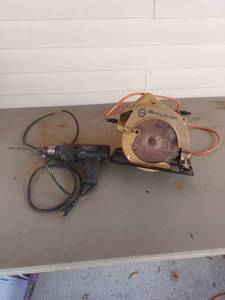 lot 2165 image: Black & Decker 38 Drill and Circular Saw Lot