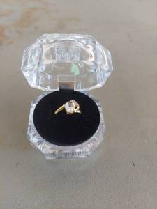 lot 2187 image: Ring with Clear Oval Stone and Accent Stones