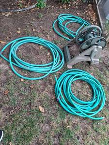 lot 1028 image: Garden Hose Reel with Hoses