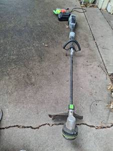 lot 1039 image: EGO Brushless Power String Trimmer with Battery and Charger