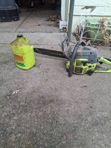 lot 1050 image: Poulan Chainsaw with Bar and Chain Oil