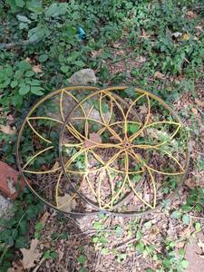 lot 1081 image: (2) Decorative Wheels Yellow Metal