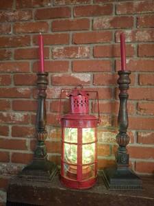 lot 1161 image: Red Metal Lantern with Two Candlesticks