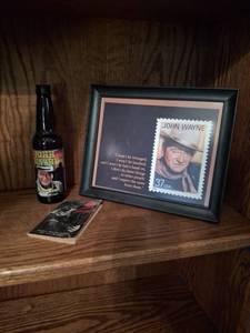 lot 1163 image: John Wayne Items - Root Beer with Framed Stamp and Book