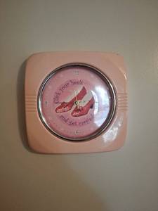 lot 9 image: Wizard of Oz Pink Metal Frame Wall Clock