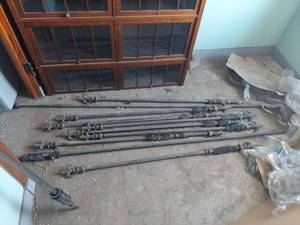 lot 1084 image: Lot of 11 Curtain Rods with Decorative Finials