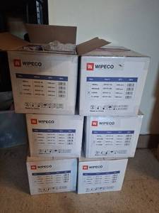 lot 1177 image: WIPECO Industries Vinyl Gloves - 5 Unopened Cases Size L and 1 Opened Case XL