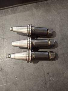 lot 1377 image: (3) Briney V40DA-180-500 Collet Chucks