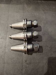 lot 1382 image: (3) Briney V40DA-180-300 Collet Chucks