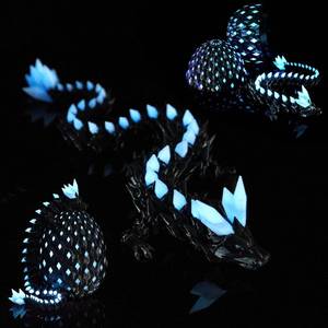 lot 7536 image: 3D Printed Dragon Egg Articulated Fidget Toy, Glow-in-the-Dark Blue