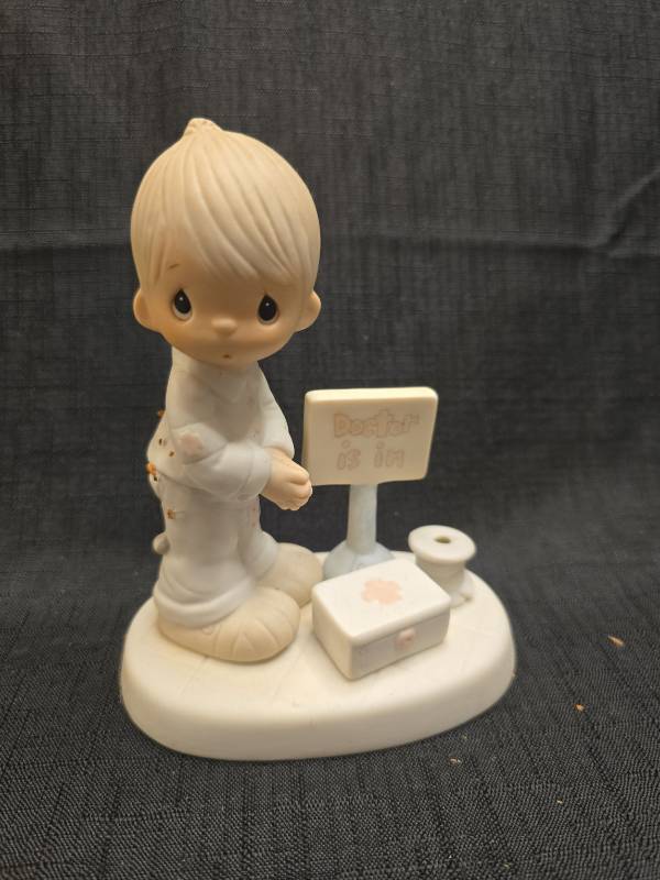 lot 1344 image: Precious Moments Doctor is In Figurine with Sign and Stethoscope