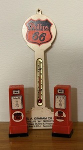 lot 517 image: Vintage Advertising - Phillips 66 Thermometer and SaltPepper Shakers