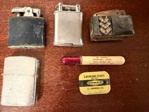 lot 524 image: Vintage Lighters and Flints in a Cigar Box