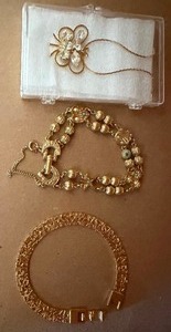 lot 547 image: Jewelry - Gold Toned Necklace w Pendant and Bracelets
