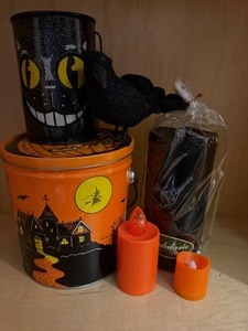 lot 104 image: Halloween Tins, Candles and More