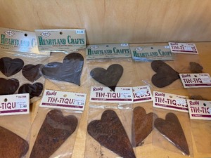 lot 134 image: Rusty Tin Hearts