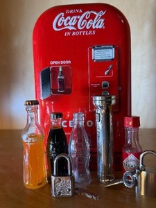 lot 137 image: CocaCola Collectibles - Tin, Mini Bottles and MORE