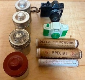 lot 138 image: Vintage Film Canisters, Film Developer and Papers, Mini Plastic Cameras