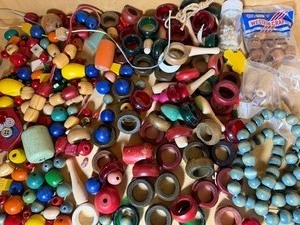 lot 142 image: Wooden Game Pieces, Beads and More in Plastic Tote