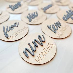 lot 2225 image: Baby Monthly Milestone Markers Disc, Wooden 3D Milestone Cards for Photos, Baby Announcement Sign,Slate Blue, 1-12 Months, 4 Inches in Size.