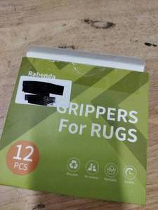 lot 14261 image: 12 Pcs Rug Grippers for Area Rugs