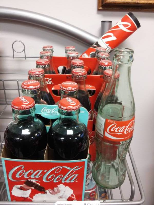 lot 4062 image: Coca-Cola Full Six-Pks & Four-Pk and Bottle