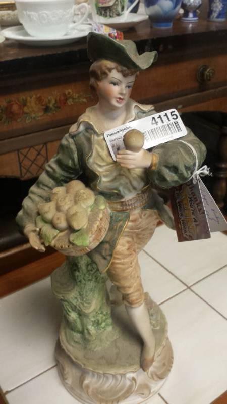 lot 4115 image: Figurine of Boy with Rolls