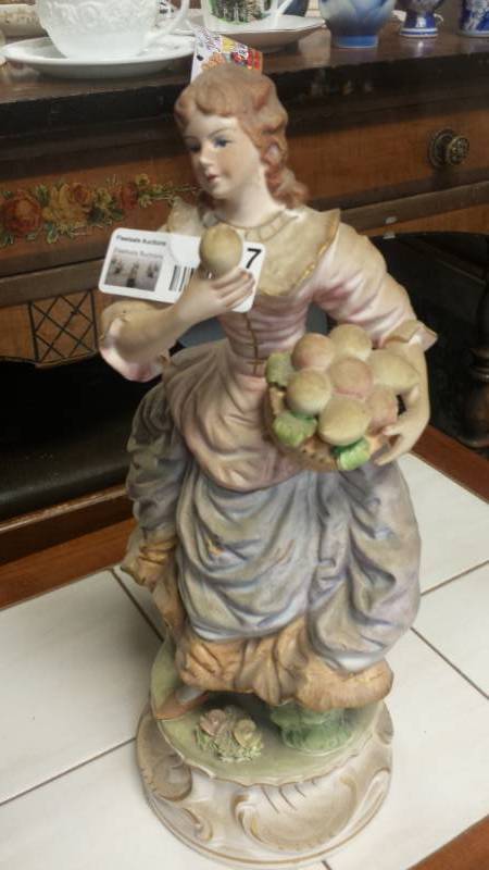 lot 4117 image: Figurine of Girl with Rolls