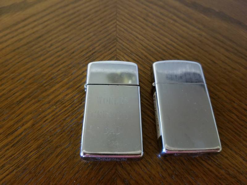 lot 3038 image: Two Zippo Type Lighters - One Engraved Worlds Greatest Dad