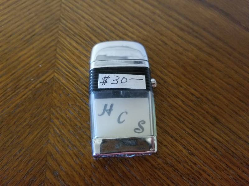 lot 3170 image: Vintage See Thru Lighter Black Chrome