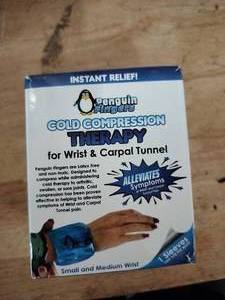 lot 2129 image: Cold Compress Penguin the Wrist Carpal Tunnel Support Small Medium