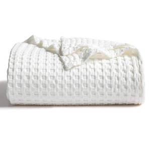 lot 7496 image: Bedsure Cooling Cotton Waffle Twin XL Blanket - Lightweight Breathable Blanket of Rayon Derived from Bamboo for Hot Sleepers, Luxury Throws for Bed, Couch and Sofa, Ivory, 66x90 Inches