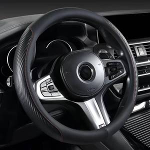 lot 2290 image: Car Steering Wheel Cover with Carbon Fiber Texture, Premium Leather Non-Slip Grip, Universal Fit for Auto SUV Truck, 14.5-15 Inch