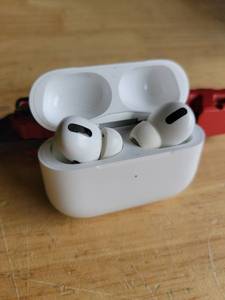 lot 20329 image: Apple AirPods Pro Wireless Earbuds with Charging Case (Connective Trouble, Sold As Is, Minor Cosmetic Damage on Case)