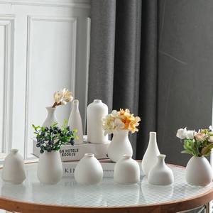 lot 7565 image: JOJUNO White Bud Vases, Small Ceramic Vase Set of 11, Mini Pottery Vases for Flowers, Decorative Pieces for Home Modern Decor, Boho Decor, Chic Accents for Living Room Dining Table Shelves