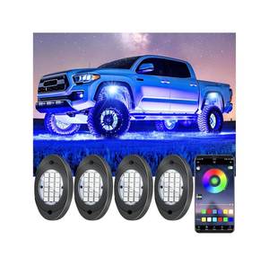 lot 12196 image: 4 Pods RGB LED Rock Lights, Underglow Multicolor Neon Light Kit, Wheel Well Light with APP Control & Music Mode, Under Glow Lights for Trucks,Jeep,SUV,Golf Cart,ATV,Pickup Off Road,12V (Missing Two)